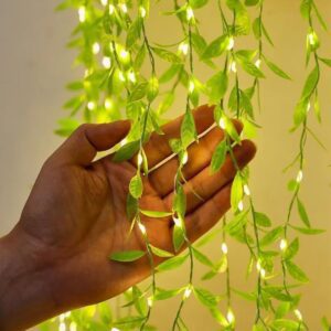 Bright green LED fairy string lights ideal for indoor and outdoor decor, creating a cosy atmosphere. Perfect for festivals, parties, and room decoration. Energy-efficient, long-lasting LED lights.